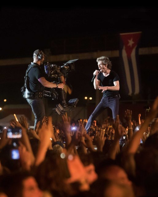 Mick Jagger and Camera Operator Dominic Jackson on stage in almost matching wardrobe, Sachtler artemis sled, Walter Klassen Rear mounted vest, Steadicam G-70 Arm, Sony F55, Canon 17-120 lens, TransvideoCineMonitorHD 6”, Anton/Bauer batteries.